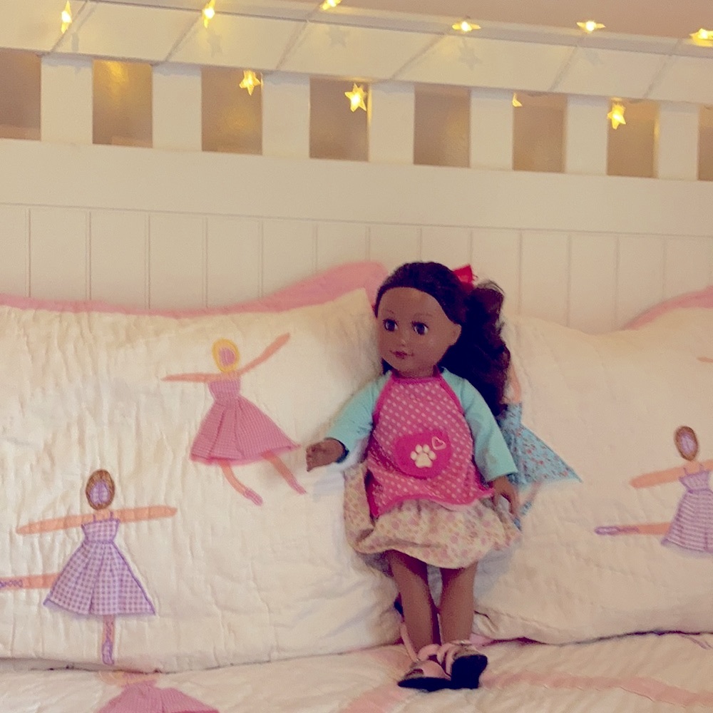 18 inch doll brown hair and eyes. Comes with all the clothing seen in pictures